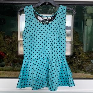 Turquoise and black polka dot peplum top